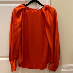 Orange satin blouse